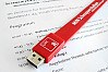 Der USB-Stick fürs Handgelenk enthält das komplette Schnupperstudium. Foto: UHH/Heinecke